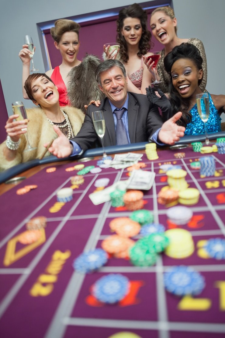 bandarkoin mobile interface showing live blackjack dealer and table selection menu